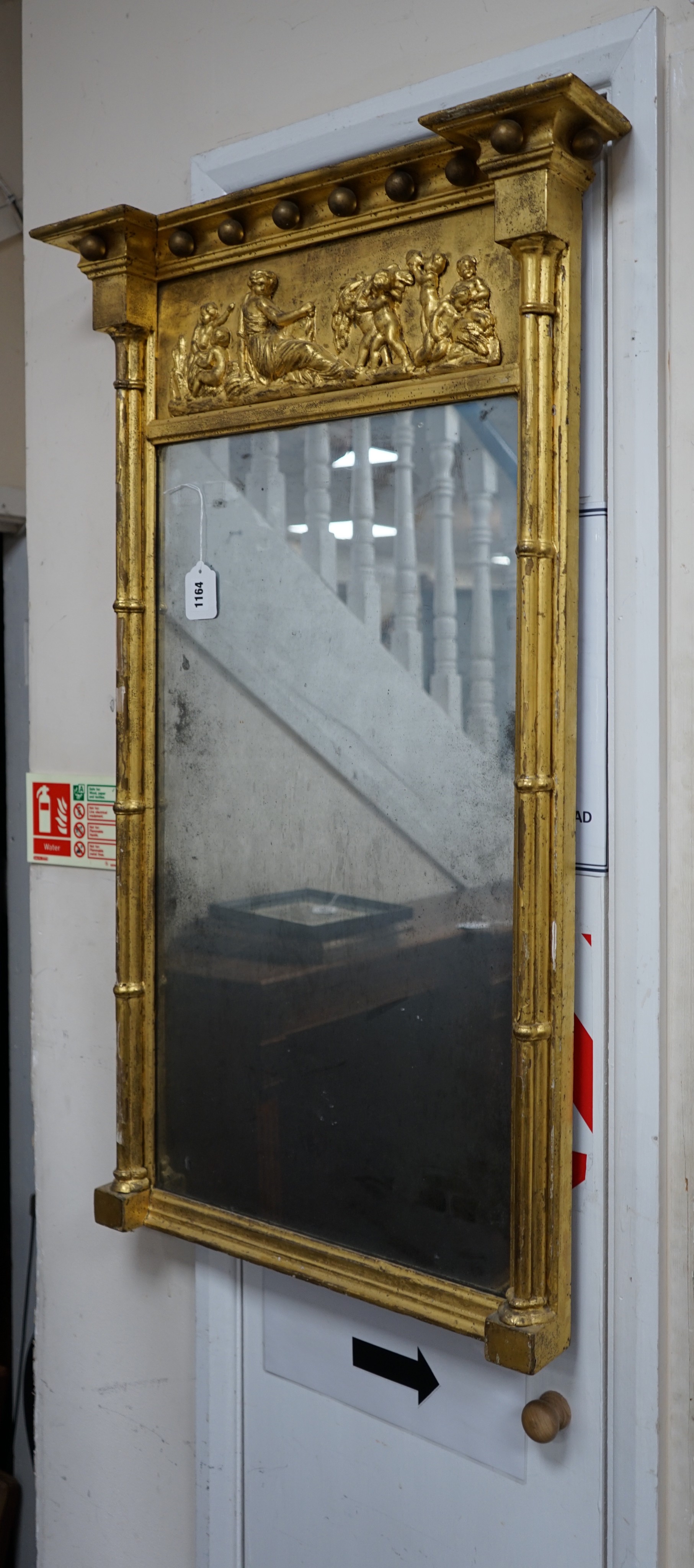 A Regency giltwood and gesso pier glass, width 60cm, height 99cm
